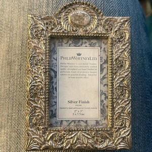 Philip Whitney ltd cast metal silver finish 2x3” frame.